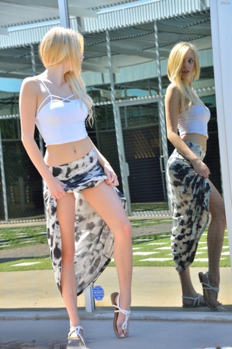 Alluring babe Blake flashes and strips completely naked in public.