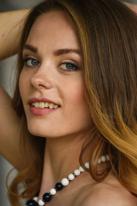 Erotic glamour model Irene sheds white dress to pose naked with tit closeup