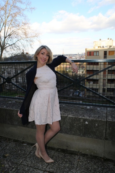 Older French woman wears a bra and tan stocking s while riding on top a dick