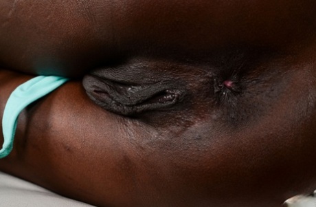 Ebony first timer Ana Foxxx releases her camel toe pussy from her yoga pants