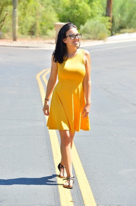 Attractive babe in glasses Saraya shows tits in public & plays with a sex toy