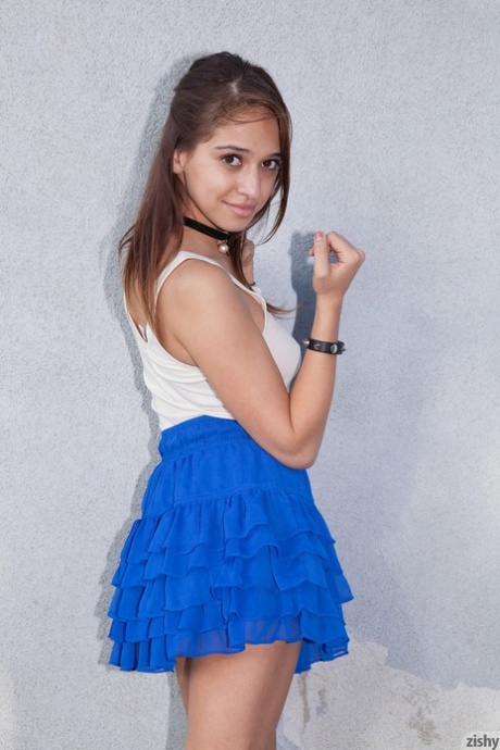 Stunning Latina teen Sara Luvv flashing her green panties in public