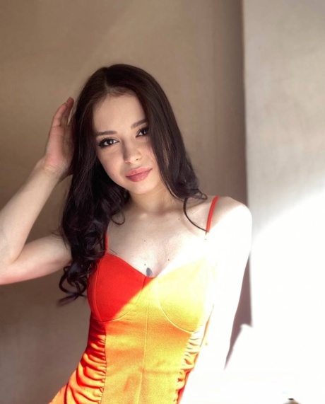 Sweet brunette teen Molly Lo takes a series of non-nude self shots