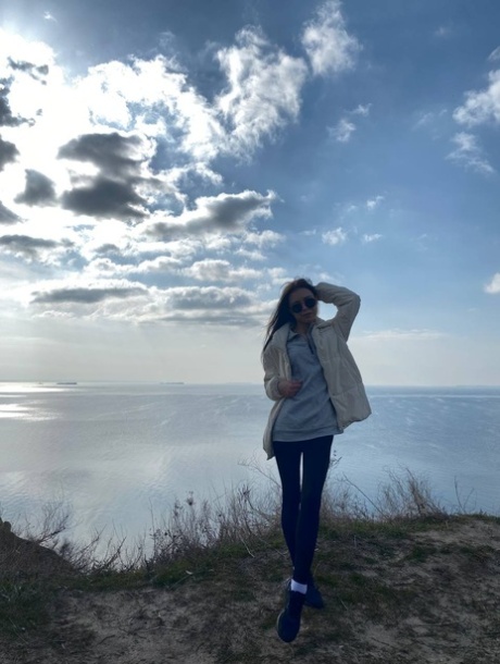 Sweet brunette teen Molly Lo takes a series of non-nude self shots