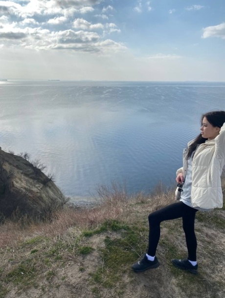 Sweet brunette teen Molly Lo takes a series of non-nude self shots