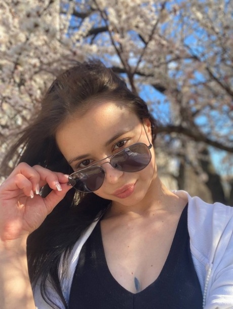 Sweet brunette teen Molly Lo takes a series of non-nude self shots