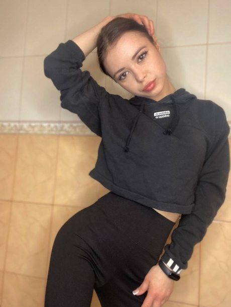 Sweet brunette teen Molly Lo takes a series of non-nude self shots