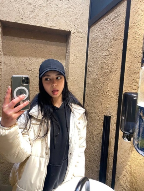 Sweet brunette teen Molly Lo takes a series of non-nude self shots