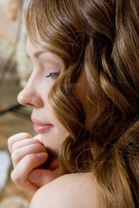 Long-haired teen Virginia Sun showing her skinny body in yellow stockings