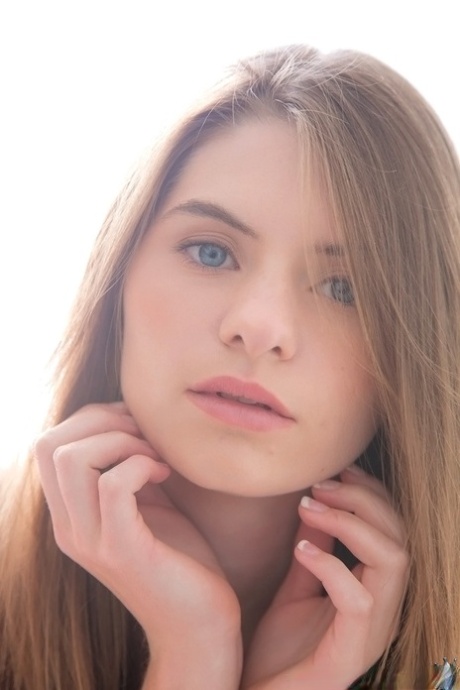 Long-haired teenage sweetie Alice March gets rid of her uniform and panties