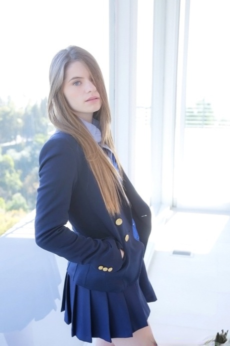 Long-haired teenage sweetie Alice March gets rid of her uniform and panties