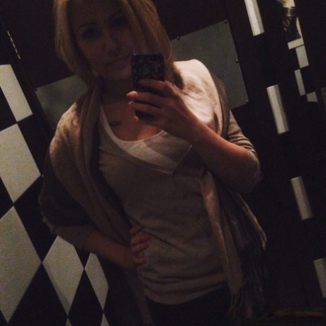 Naughty blonde amateur shows her lovely tits & takes selfies around the house