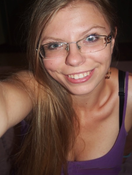 Sexy amateur teacher gets topless and takes selfies of her juicy breasts