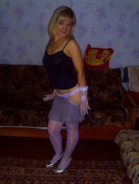 Blonde beauty strips in a solo and shows her tiny tits and big ass