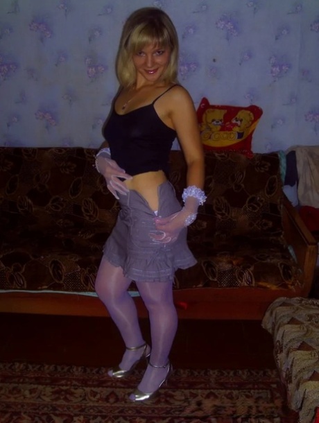 Blonde beauty strips in a solo and shows her tiny tits and big ass