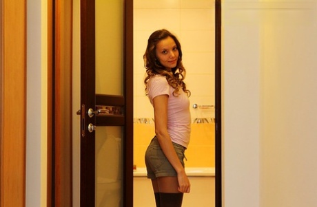 Young amateur Katya shows her butt cheeks in homemade solo shoot