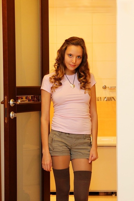 Young amateur Katya shows her butt cheeks in homemade solo shoot