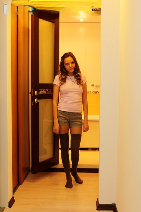 Young amateur Katya shows her butt cheeks in homemade solo shoot