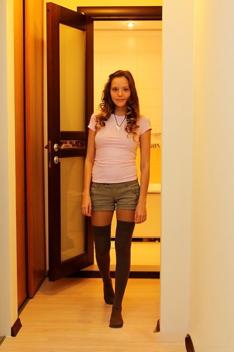 Young amateur Katya shows her butt cheeks in homemade solo shoot