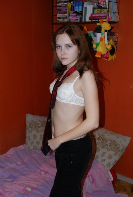 Brunette amateur strips naked, shows her pink holes & dons pink leg cuffs