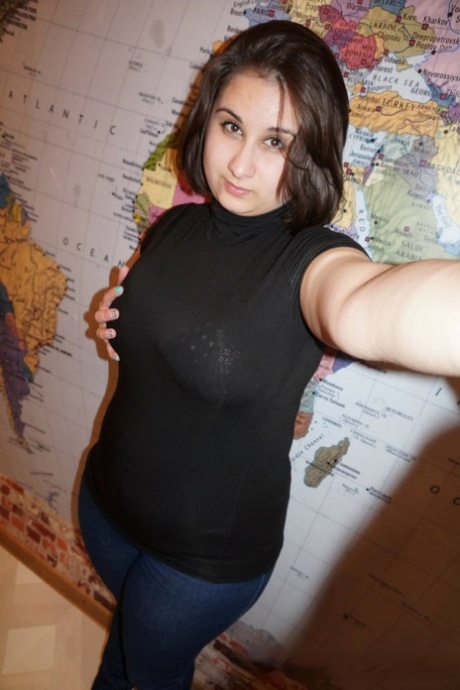 Chubby amateur brunette shows off her monster natural tits and ass