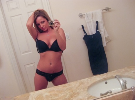 Amateur model Nikki Sims takes nude selfies in a safe for work manner