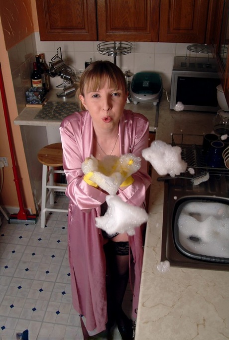 Horny amateur Amanda H reveals her cute boobs and masturbates in the kitchen