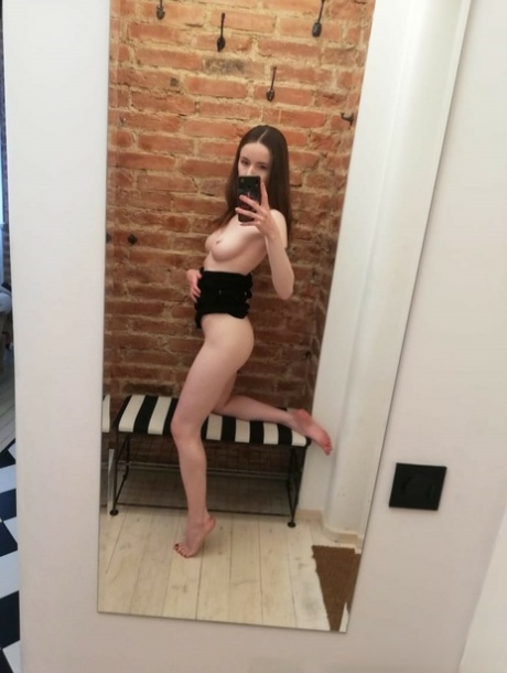 Skinny amateur teen posing naked and in her sexy dress in the mirror