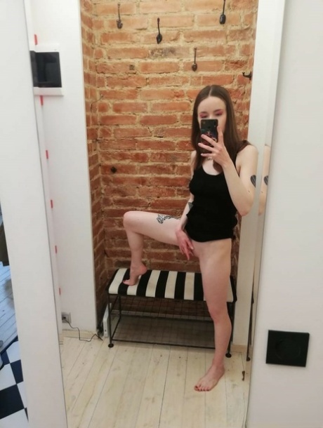 Skinny amateur teen posing naked and in her sexy dress in the mirror