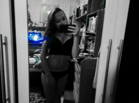 Naughty amateur teen poses in the mirror for selfies in hot outfits & lingerie