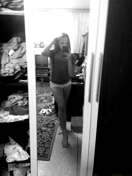 Naughty amateur teen poses in the mirror for selfies in hot outfits & lingerie