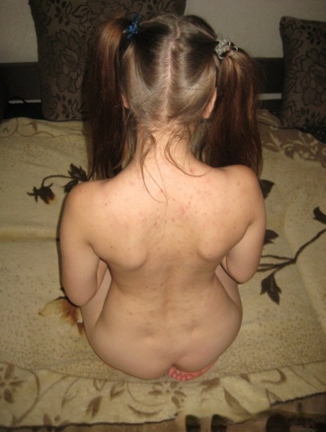 Pigtailed amateur brunette revealing her innocent holes, boobs and feet