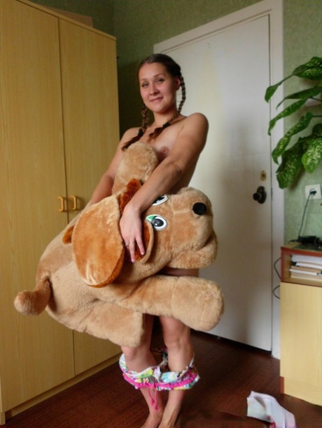 Naked amateur shows off her tiny tits while playing with her teddy