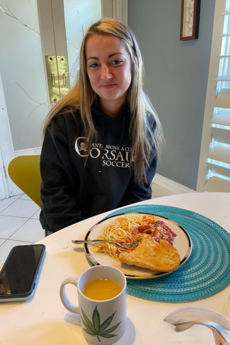 Amateur babe Lily Adams shows her tampon in front of a Christmas tree