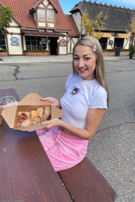 Amateur babe Lily Adams shows her tampon in front of a Christmas tree