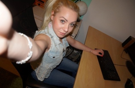 Blonde amateur takes nude selfies around the house showing her tiny tits