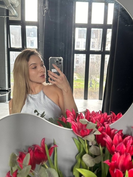 Glamorous OnlyFans babe All About Diana posing provocatively in a solo