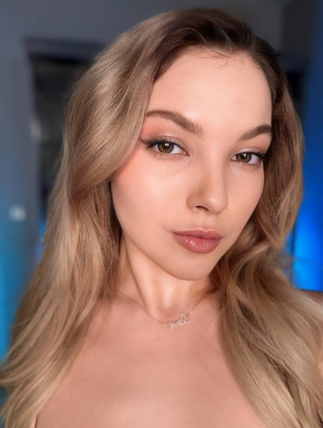 Glamorous OnlyFans babe All About Diana posing provocatively in a solo