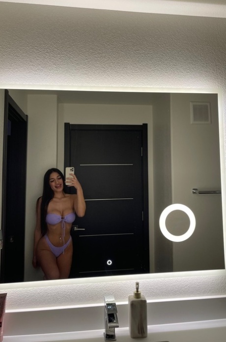 Brunette babe Maddie Gech teases with her amazing ass and shows her breasts