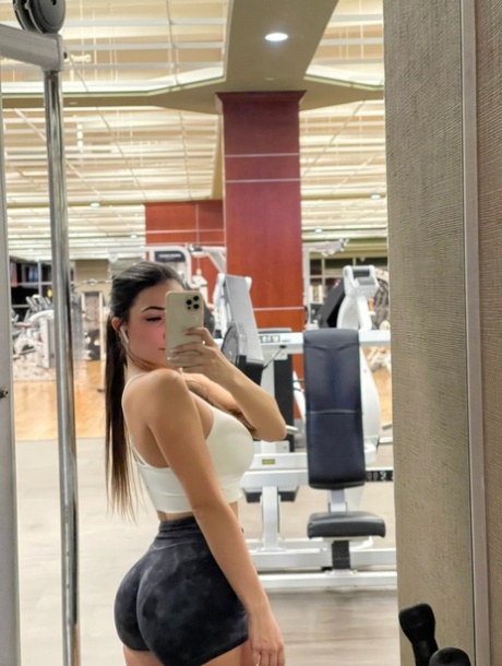 Brunette babe Maddie Gech teases with her amazing ass and shows her breasts