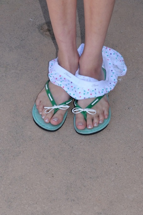 Cute brunette teen Matti Parker unveils her breasts and toys herself outdoors