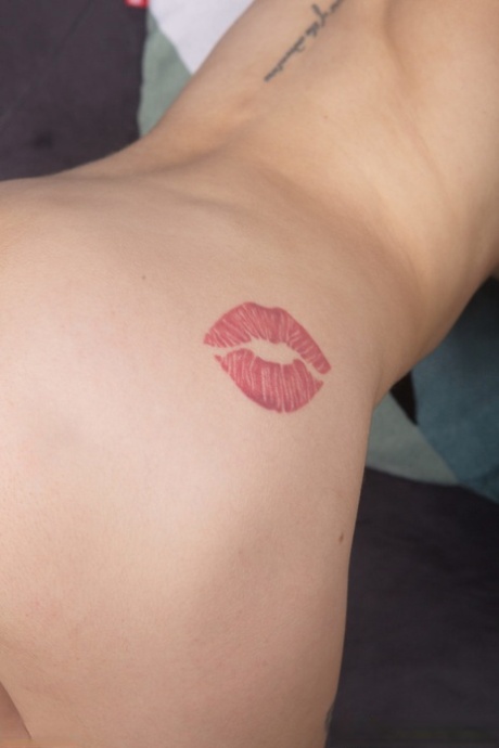 Hot blonde babe Sarah M fingering and dildoing her puffy pussy on the sofa