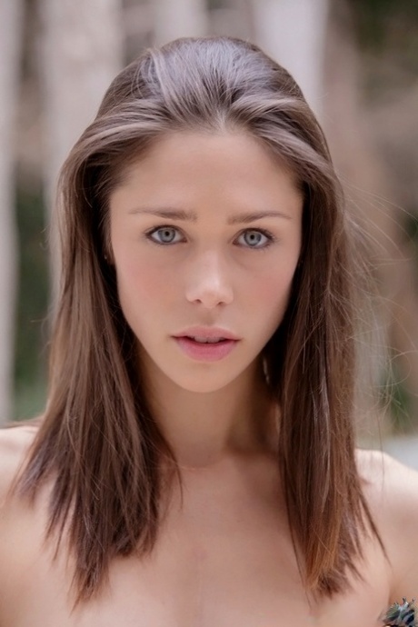 Amazingly lovely teen Anastasia Morna slipping off her school uniform