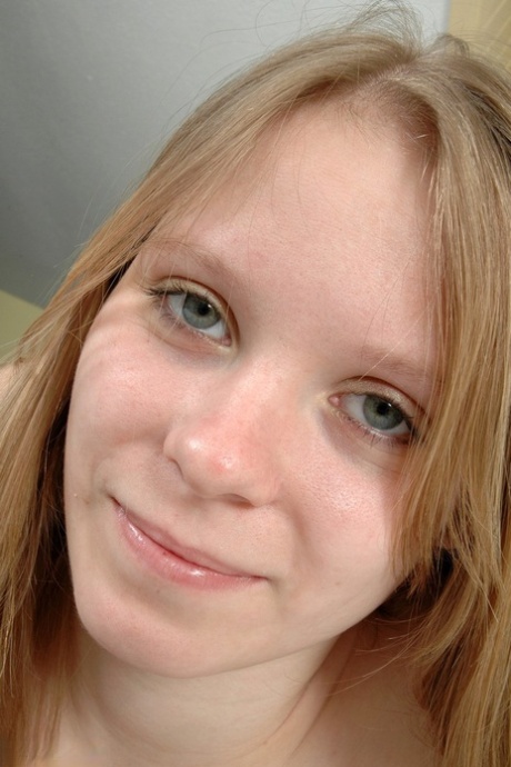 Amateur cutie Caroline exposes her huge natural knockers and sexy soles