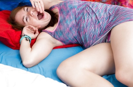 Barely legal chubby Lotte playing with tiny tits and masurbating