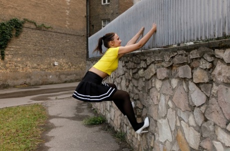 Ukrainian babe Oxana Chic flashes her ass in pantyhose in public