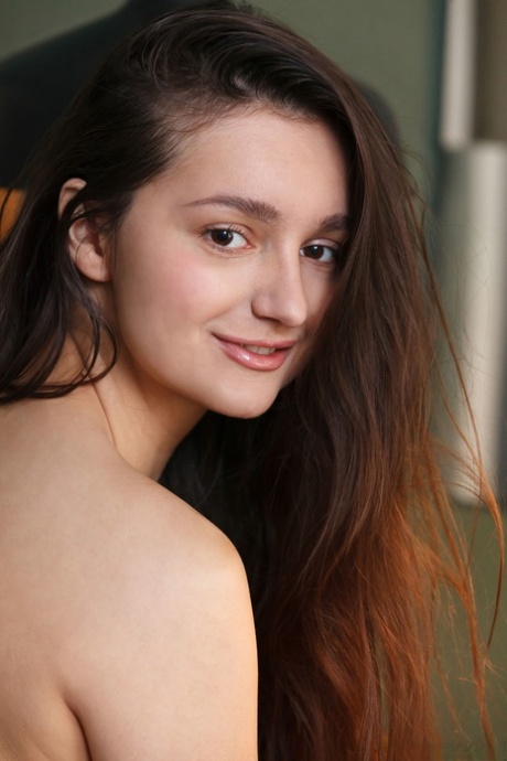 Brunette beauty Adeline massages her big boobs and spreads her hairy pussy