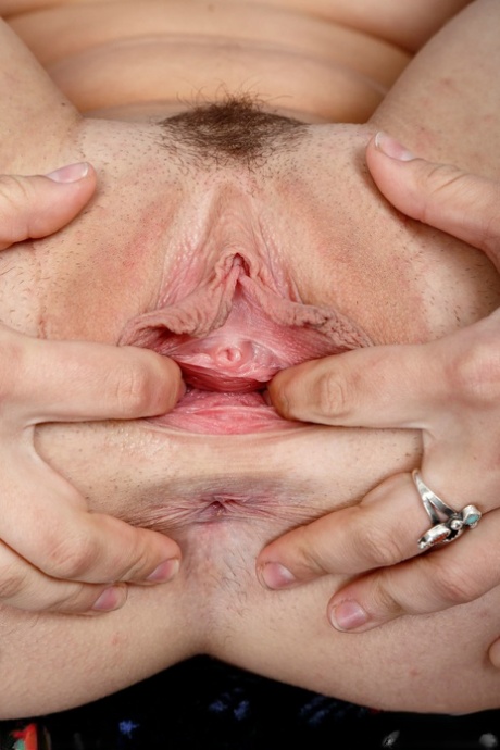 Beautiful blonde Haley Reed strips and spreads her trimmed pussy outdoors