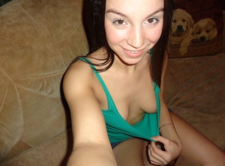 Amateur sweetheart eats a banana while showing off her natural tits & hot muff