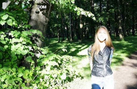 Slim amateur uncovers her small tits in blue jeans during homemade action